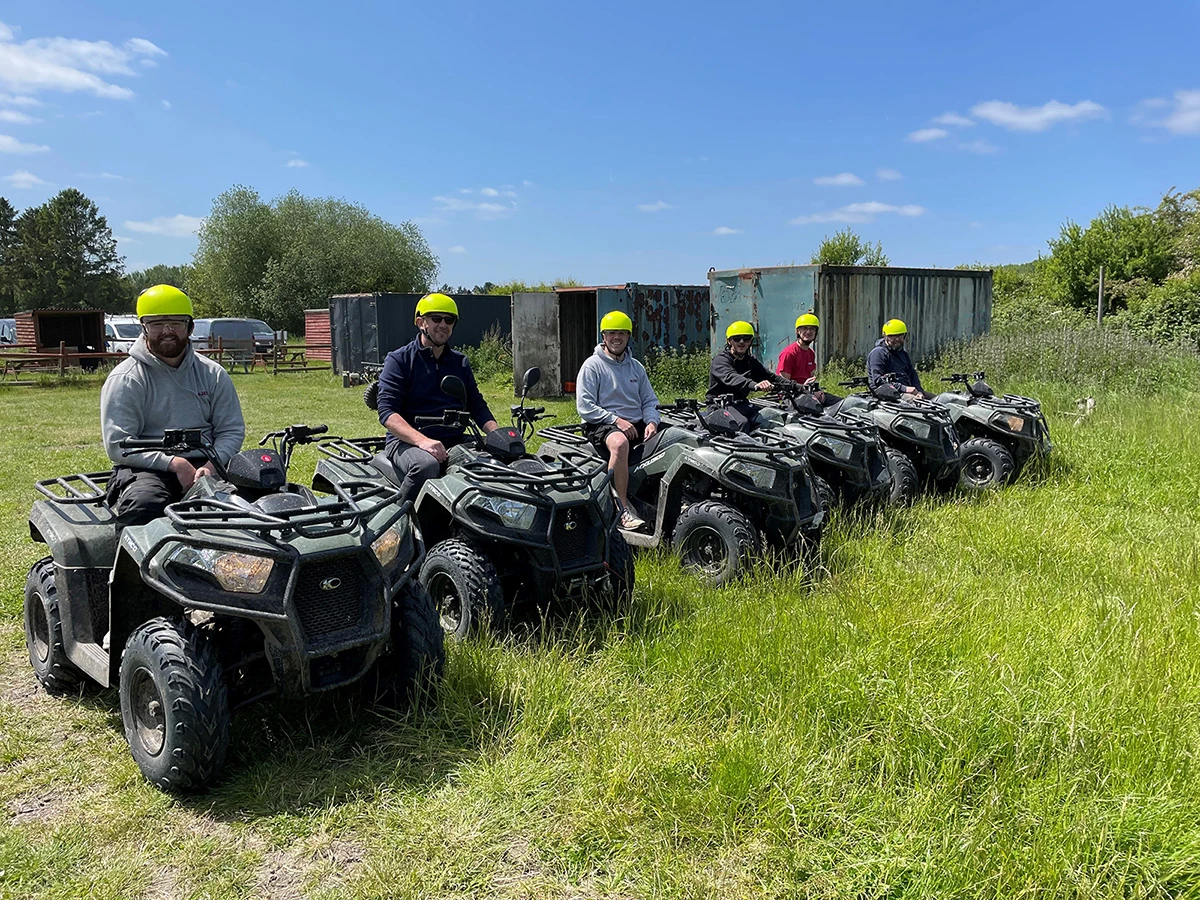 The Bojen team on quad bikes